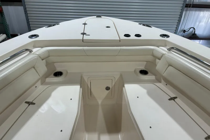  Yacht Photos Pics 2019 Grady-White Canyon 336 boat interior with seating and storage compartments.