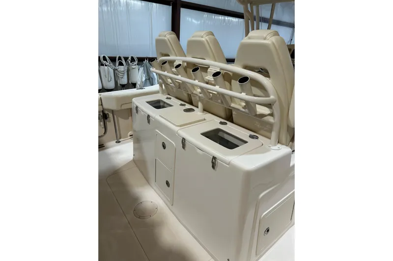  Yacht Photos Pics 2019 Grady-White Canyon 336 boat interior with seating and storage compartments.