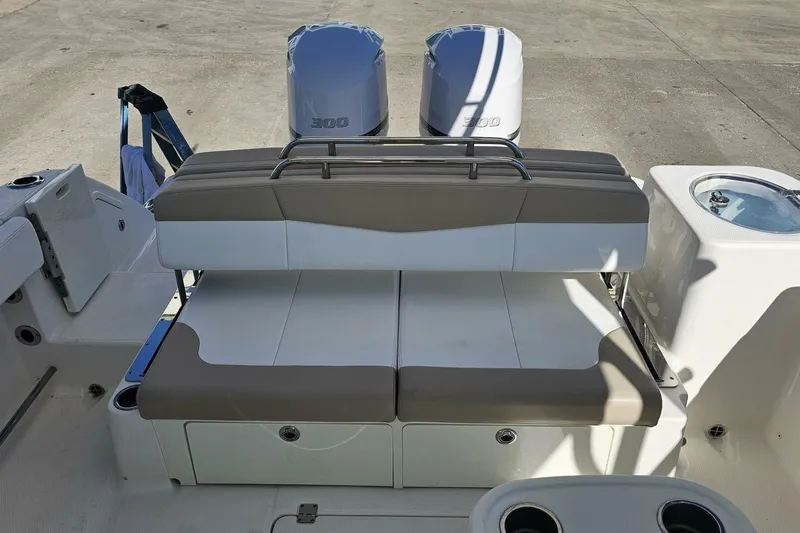  Yacht Photos Pics 2018 Robalo R317 Dual Console boat with twin 300 engines and seating area.