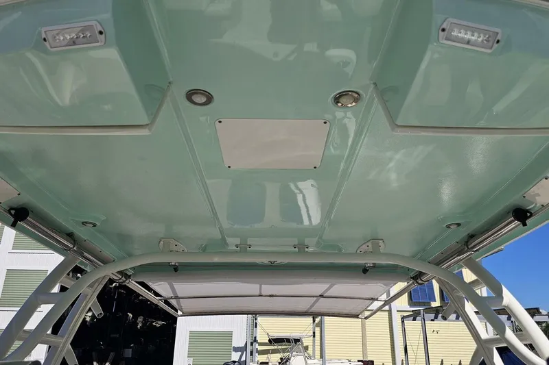  Yacht Photos Pics 2018 Robalo R317 Dual Console boat roof with integrated lights and sleek design.