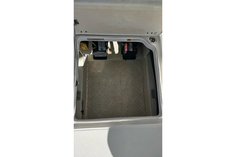  Yacht Photos Pics Open storage compartment in 2018 Robalo R317 Dual Console boat.