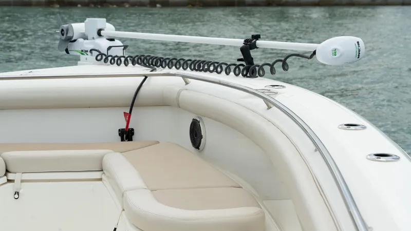  Yacht Photos Pics 2019 Boston Whaler 350 Outrage boat interior with seating and trolling motor.