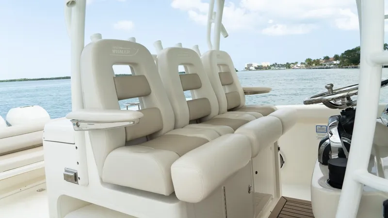  Yacht Photos Pics 2019 Boston Whaler 350 Outrage boat seats with ocean view in background.