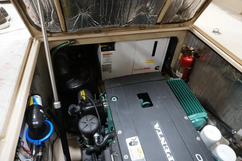  Yacht Photos Pics Engine compartment of 2013 Ranger Tugs S-31 with Volvo Penta engine and fire extinguisher.