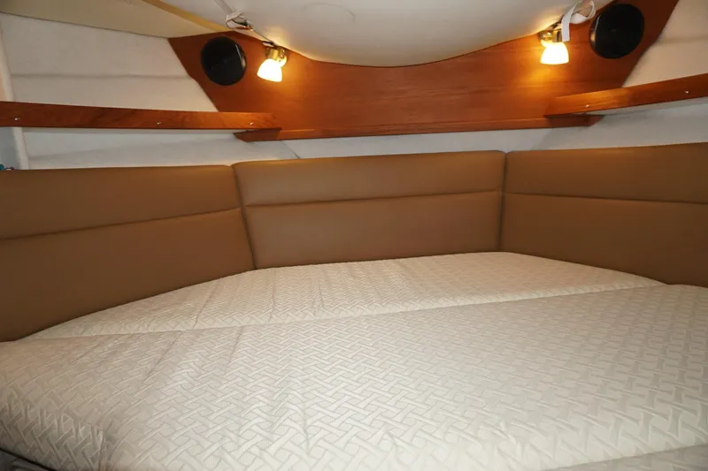  Yacht Photos Pics 2013 Ranger Tugs S-31 interior cabin with cozy bed and ambient lighting.