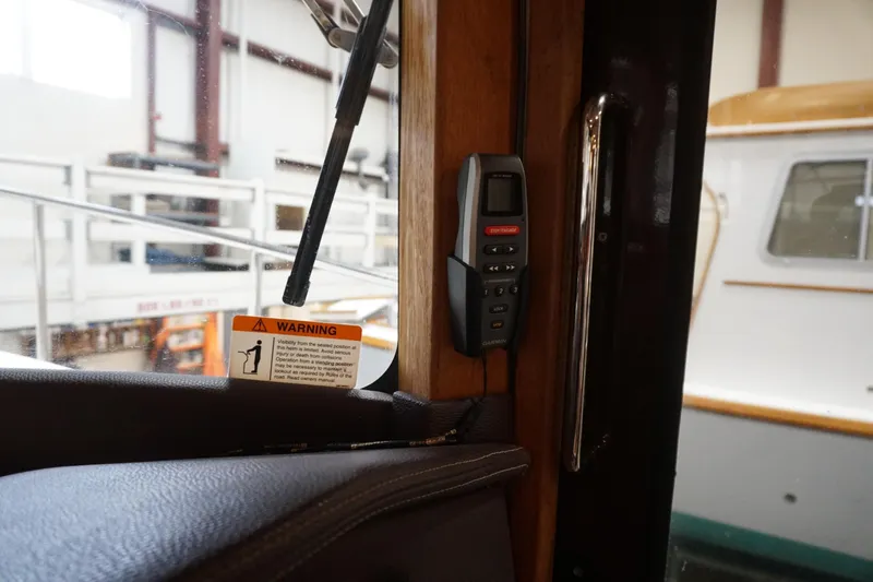  Yacht Photos Pics Interior of 2013 Ranger Tugs S-31 with Garmin device and warning label.