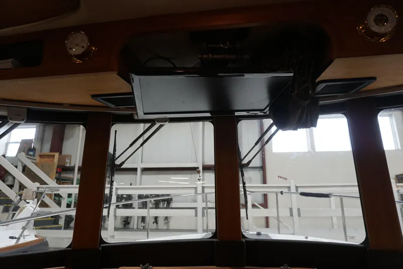  Yacht Photos Pics Interior view of 2013 Ranger Tugs S-31 boat with windows and equipment.