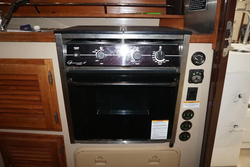  Yacht Photos Pics 2013 Ranger Tugs S-31 interior with built-in oven and control panel.