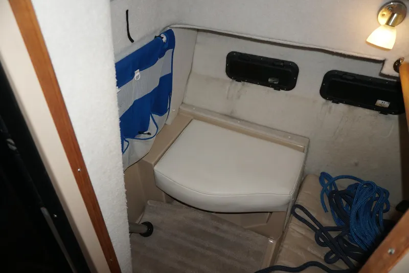  Yacht Photos Pics 2013 Ranger Tugs S-31 interior cabin with seating, storage, and nautical decor.