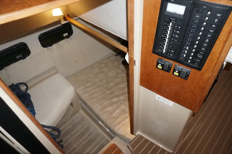  Yacht Photos Pics 2013 Ranger Tugs S-31 cabin interior with control panel and sleeping area.