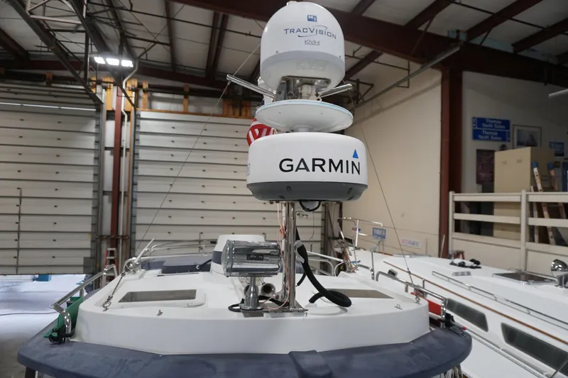  Yacht Photos Pics 2013 Ranger Tugs S-31 with Garmin and TracVision equipment in a boat storage facility.
