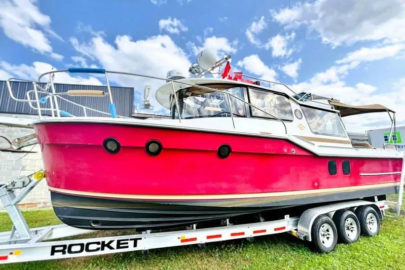  Yacht Photos Pics 2017 Ranger Tugs R-29S boat on trailer under blue sky.