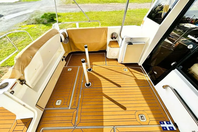  Yacht Photos Pics 2017 Ranger Tugs R-29S boat deck with teak flooring and seating area.