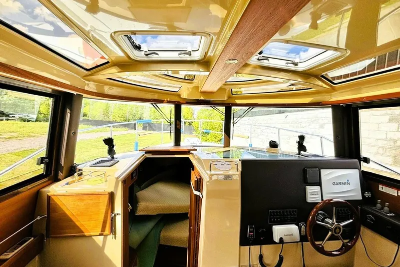  Yacht Photos Pics Interior of 2017 Ranger Tugs R-29S boat with Garmin navigation system and sunroof.