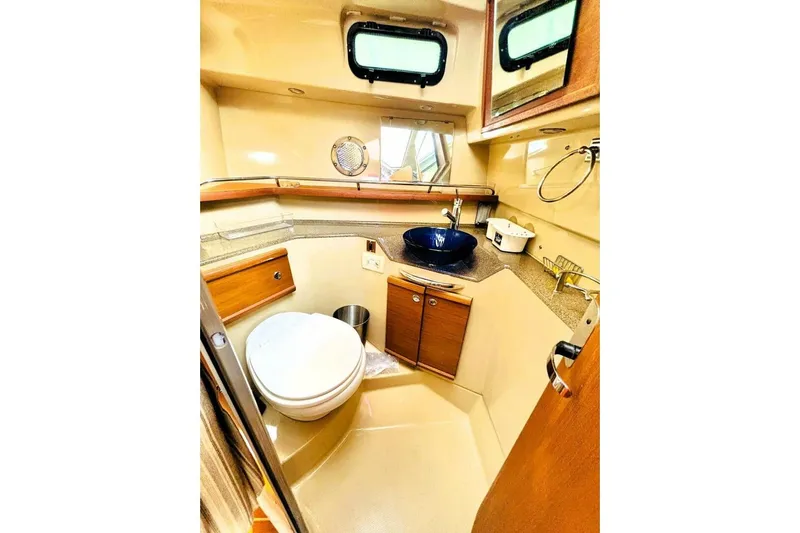  Yacht Photos Pics 2017 Ranger Tugs R-29S bathroom with modern fixtures and compact design.