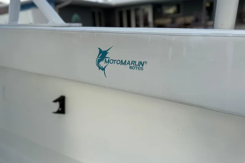  Yacht Photos Pics 2021 Marlin 39 CC boat with "Motomarlin Botes" logo on the side.