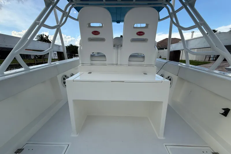  Yacht Photos Pics 2021 Marlin 39 CC boat interior with dual white seats and sturdy framework.