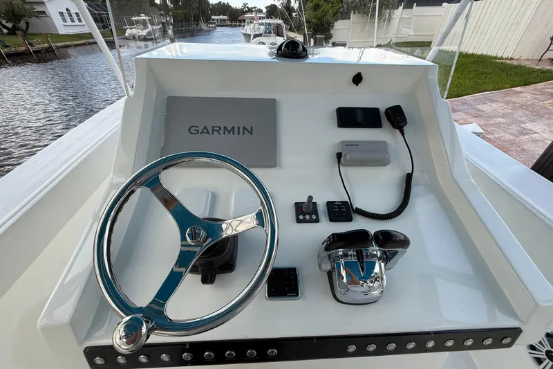  Yacht Photos Pics 2021 Marlin 39 CC boat dashboard with Garmin navigation and control systems.