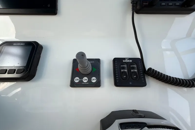  Yacht Photos Pics Control panel of a 2021 Marlin 39 CC boat with Suzuki and Lenco systems.