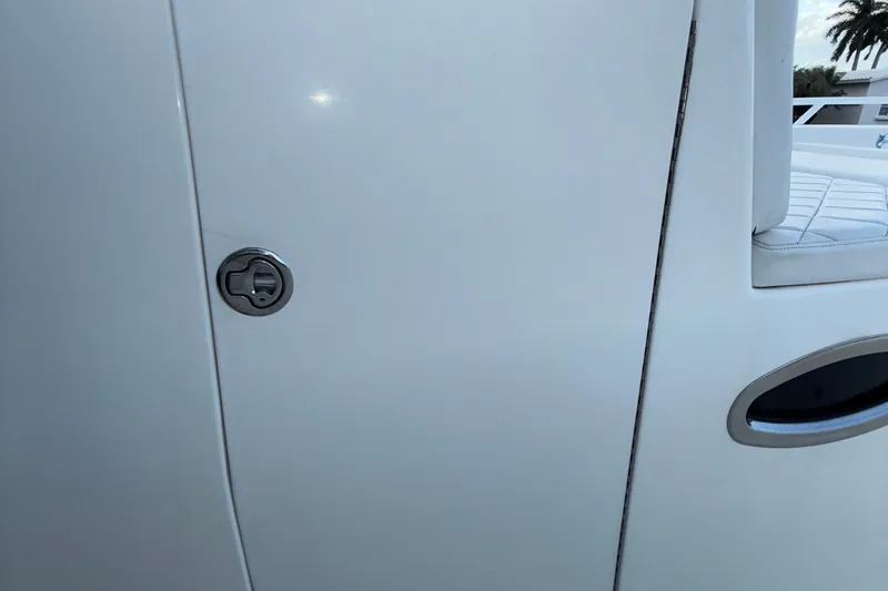  Yacht Photos Pics 2021 Marlin 39 CC boat door with sleek handle and white finish.