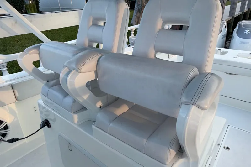  Yacht Photos Pics Luxury seating on 2021 Marlin 39 CC boat, featuring plush white upholstery.