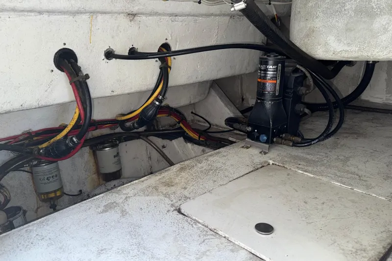  Yacht Photos Pics Engine compartment of 2021 Marlin 39 CC boat with hydraulic system and wiring.