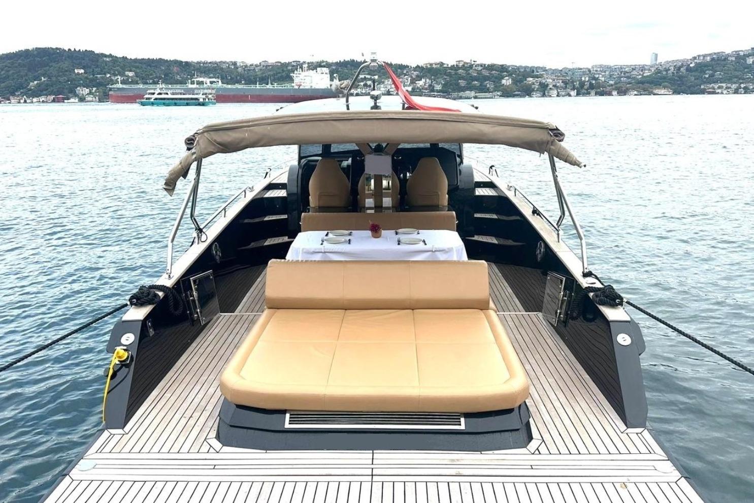 2024 Focus Forza 37 yacht with elegant deck and seating, docked on serene waters.