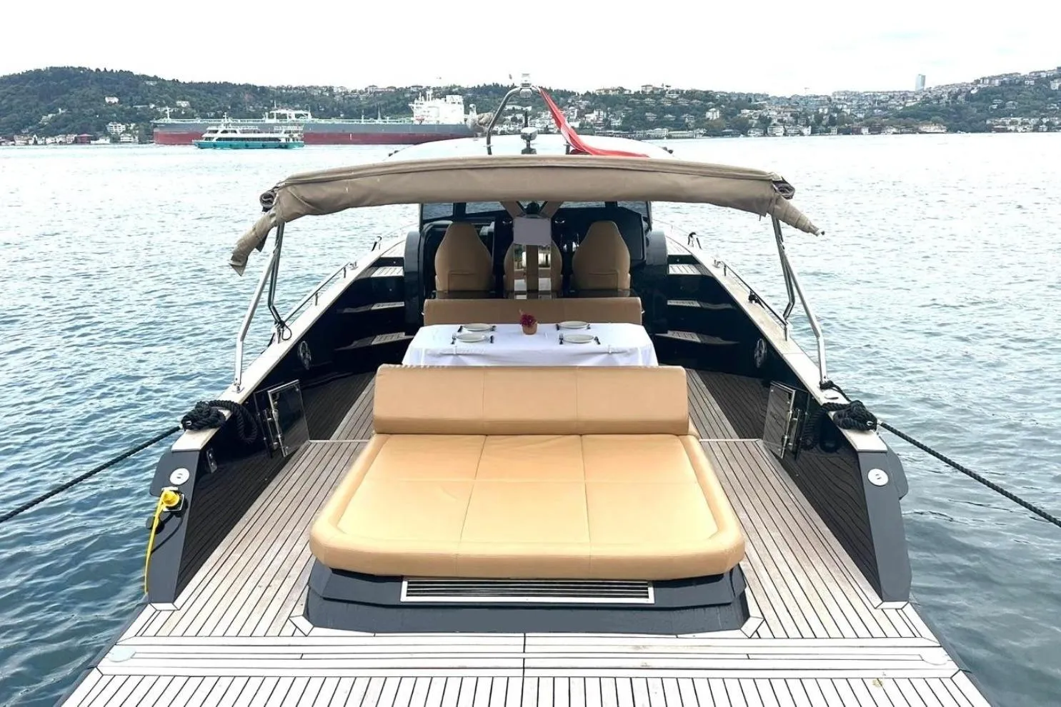2024 Focus Forza 37 yacht with elegant deck and seating, docked on serene waters.