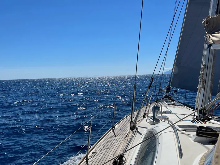 Jethro Yacht Photos Pics Sailing Jeanneau Sun Odyssey 54 DS, 2003 model, on a sunny ocean day.