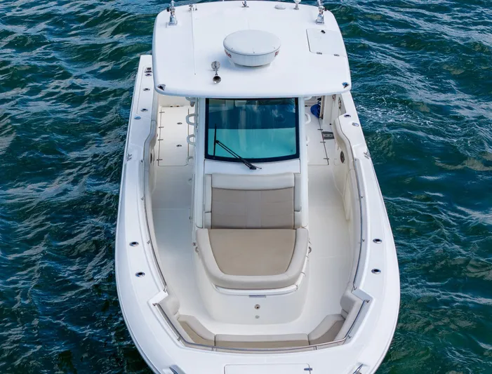 Rocco Yacht Photos Pics 2020 Boston Whaler 330 Outrage boat on water, top view.