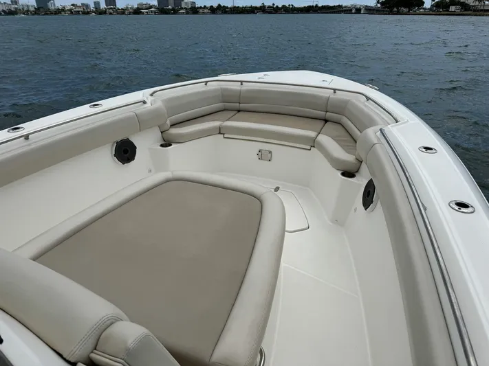 Rocco Yacht Photos Pics 2020 Boston Whaler 330 Outrage boat with spacious seating on the water.