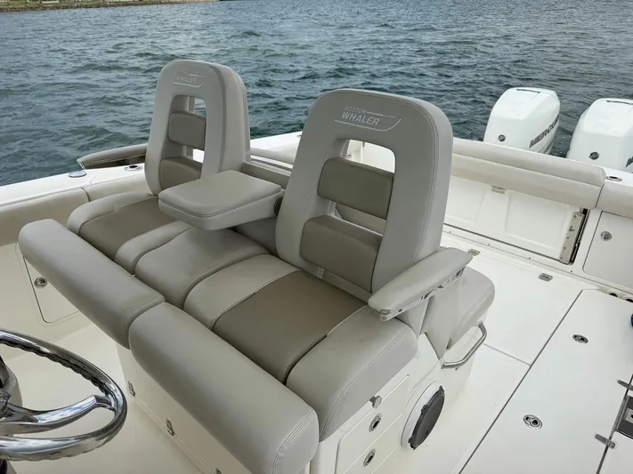 Rocco Yacht Photos Pics 2020 Boston Whaler 330 Outrage boat with comfortable seating and twin engines.