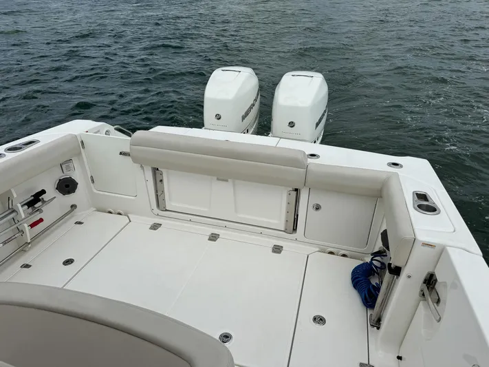 Rocco Yacht Photos Pics 2020 Boston Whaler 330 Outrage boat deck with twin outboard engines.