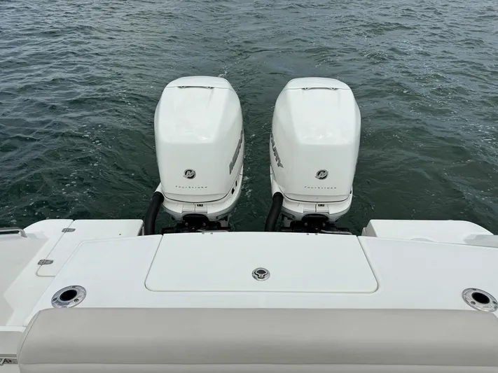 Rocco Yacht Photos Pics 2020 Boston Whaler 330 Outrage twin outboard engines on water.