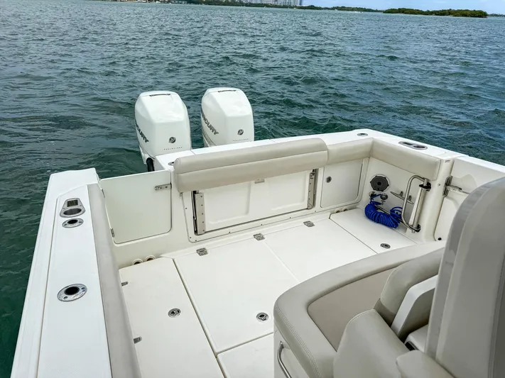 Rocco Yacht Photos Pics 2020 Boston Whaler 330 Outrage boat with twin engines on the water.