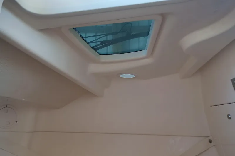 325-708 Brokerage Josh Yacht Photos Pics Interior cabin view of 2021 Grady-White Freedom 325 boat with skylight.