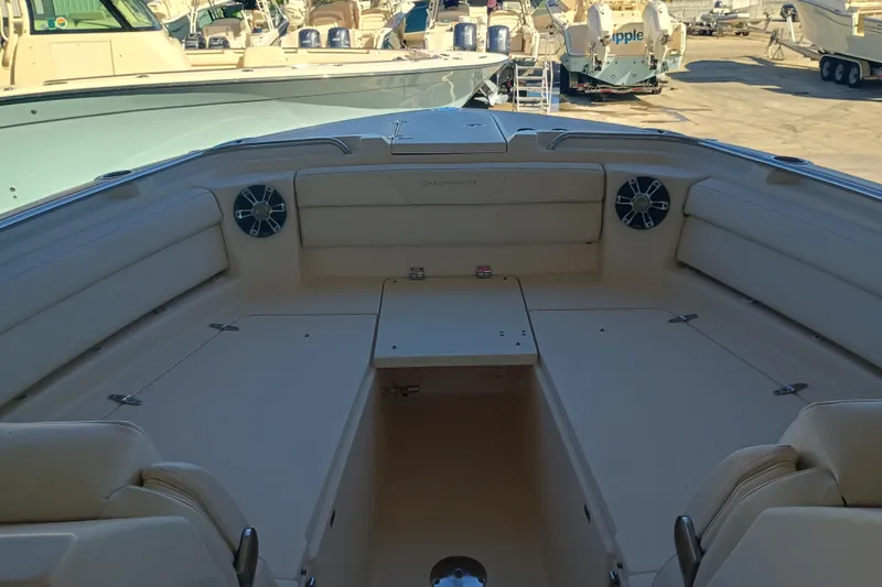 325-708 Brokerage Josh Yacht Photos Pics 2021 Grady-White Freedom 325 boat interior with spacious seating and modern design.