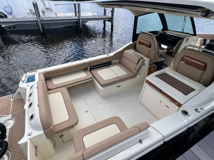  Yacht Photos Pics 2024 Chris-Craft Calypso 32 boat interior with luxurious seating and modern design.