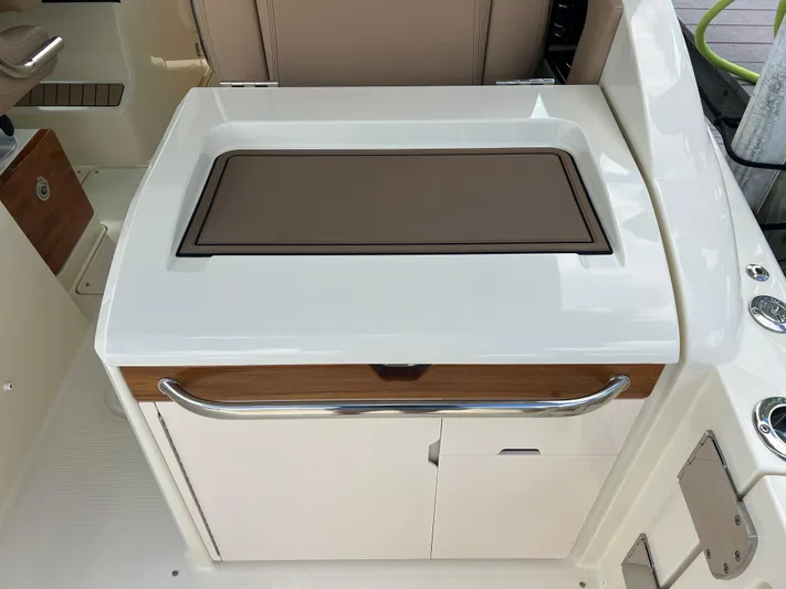  Yacht Photos Pics 2024 Chris-Craft Calypso 32 interior detail with sleek cabinetry and modern design.