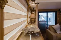 Luxurious interior of 2024 Custom Canyon 92 yacht with elegant decor and sea view.
