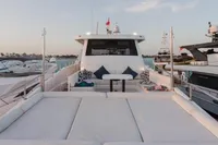 Luxurious 2024 Custom Canyon 92 yacht with spacious deck and elegant seating area.
