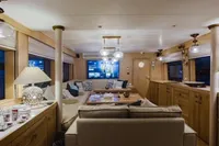 Luxurious interior of 2024 Custom Canyon 92 yacht with elegant seating and modern decor.