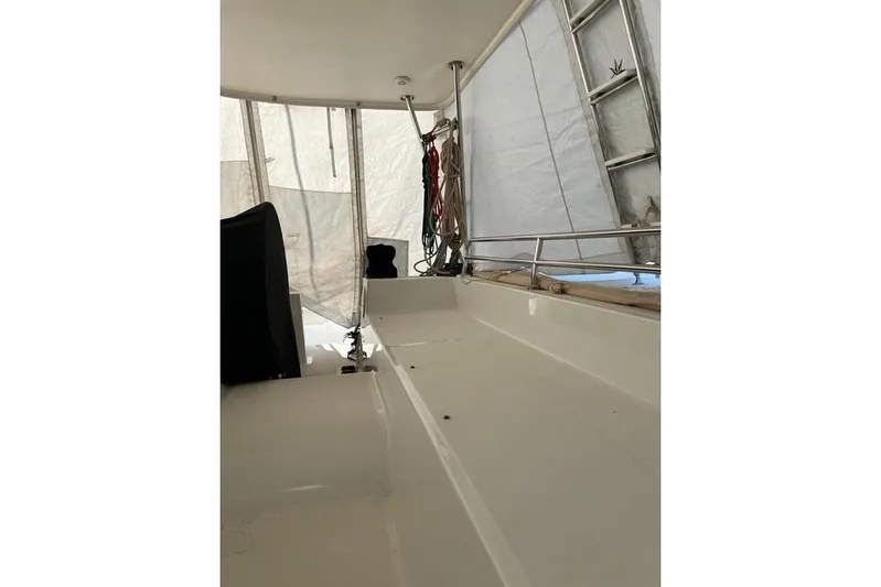  Yacht Photos Pics Interior view of a 2018 Lagoon 450 F catamaran, featuring a covered deck area.