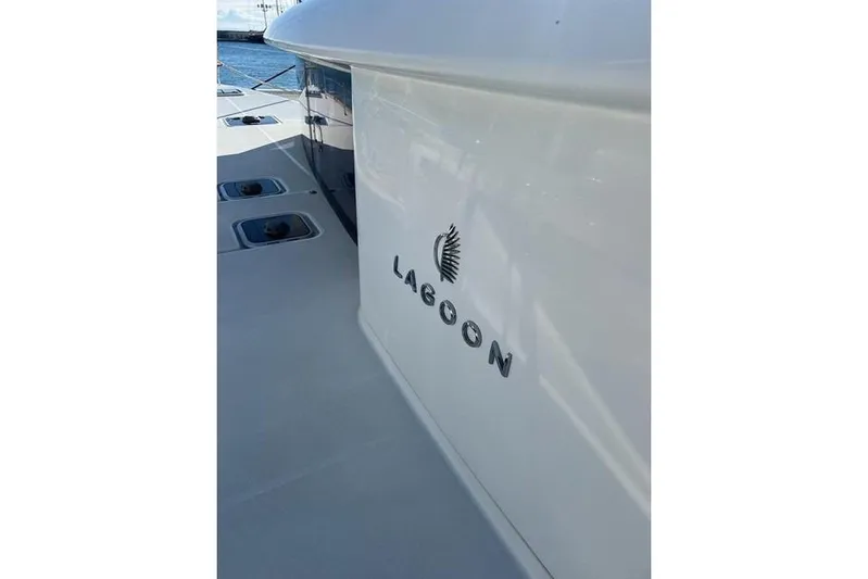  Yacht Photos Pics 2018 Lagoon 450 F catamaran, sleek design with logo detail.