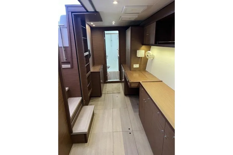  Yacht Photos Pics Interior of 2018 Lagoon 450 F yacht, featuring wood cabinetry and modern design.