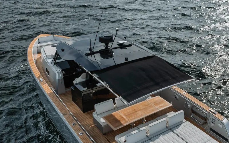  Yacht Photos Pics Luxury 2022 Pardo Yachts 43 cruising on open water, featuring sleek design and spacious deck.