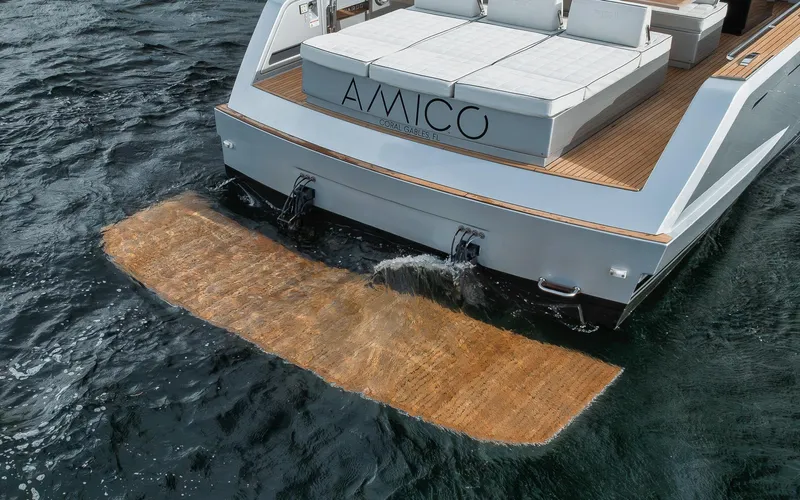  Yacht Photos Pics Sleek 2022 Pardo Yachts 43 with spacious deck and swim platform on the water.