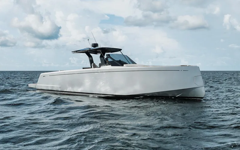  Yacht Photos Pics 2022 Pardo Yachts 43 cruising on open water under a cloudy sky.