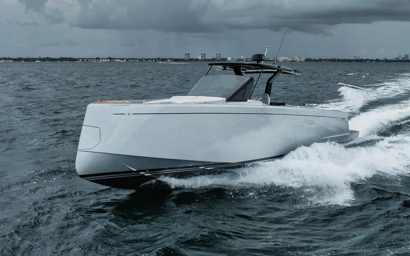  Yacht Photos Pics 2022 Pardo Yachts 43 cruising on open water under cloudy skies.