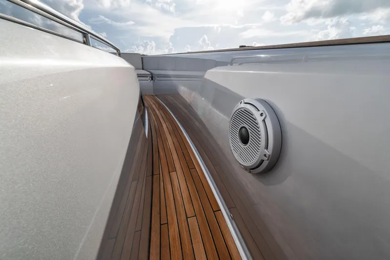  Yacht Photos Pics 2022 Pardo Yachts 43 deck with sleek wood finish and speaker detail.